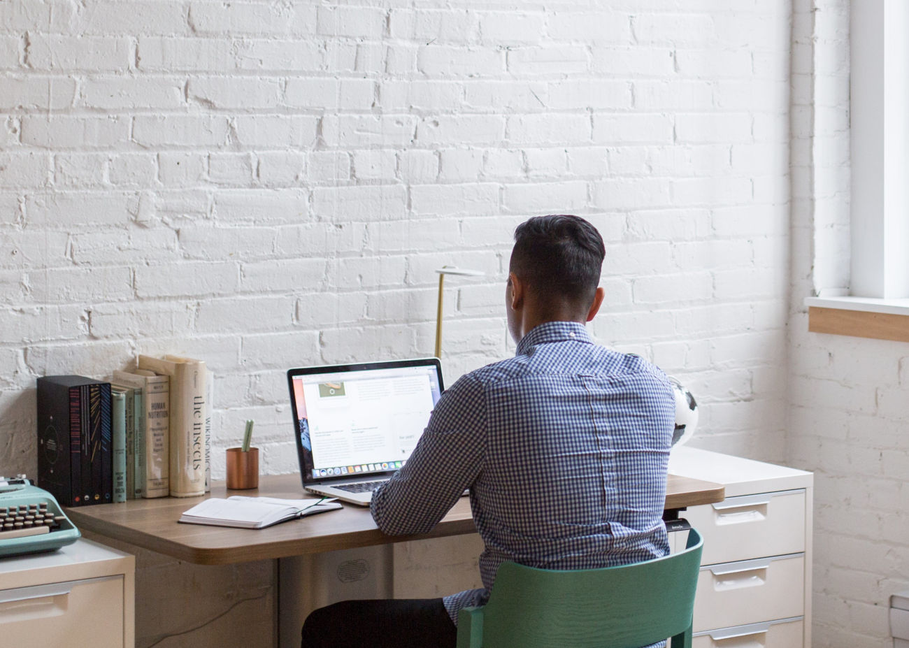 Researcher reviewing scientific documents and data